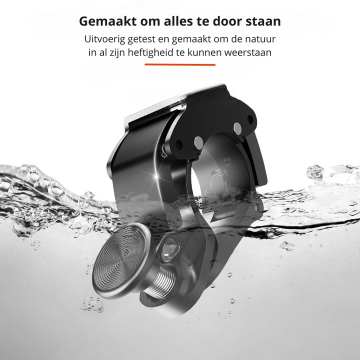 Close-up van de strakke, zilveren BikeBlast RVS fietsbel met helder geluid. Een modern fietsaccessoire.