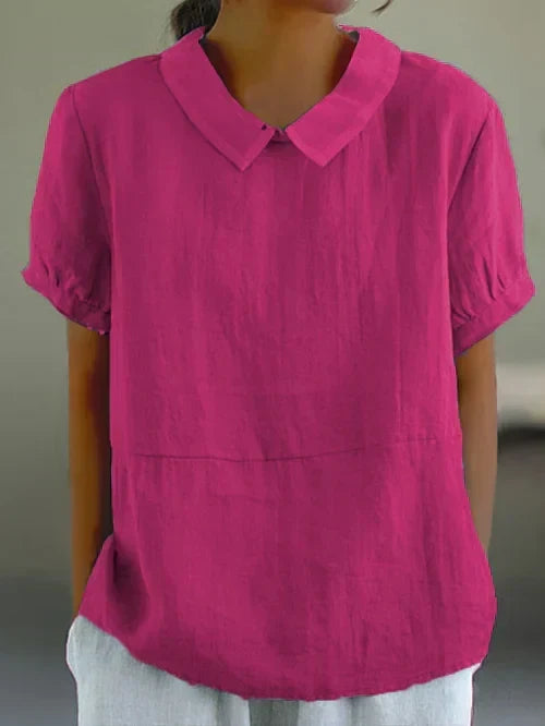 Veelzijdige effen dames top voor lente en zomer. Comfortabele, tijdloze bovenkleding die elegantie combineert.