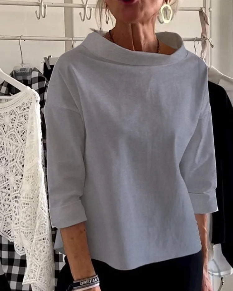 Moderne dames top met revers en halve col. Stijlvolle en comfortabele keuze voor lente zomer damesmode.