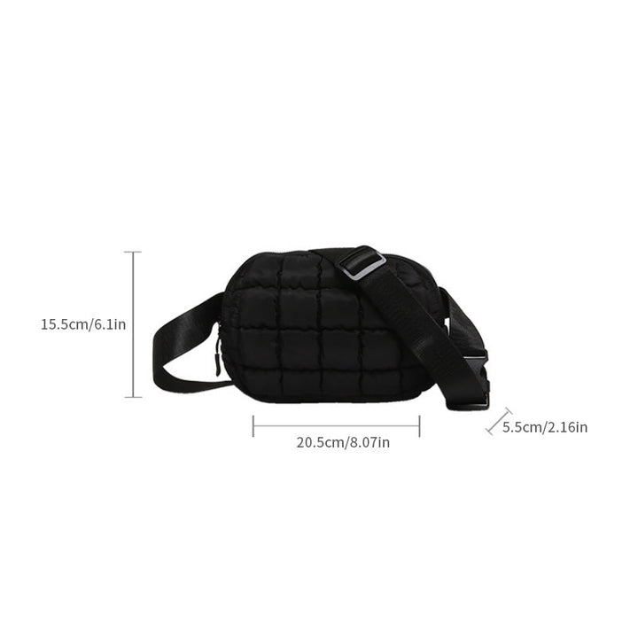 Detail van de zachte puffer textuur op deze stijlvolle crossbody tas voor vrouwen.