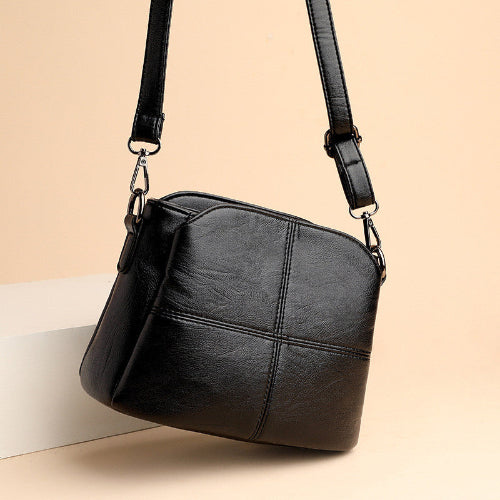 Modieuze groene dames schoudertas van PU leer, te dragen als handtas of crossbody; elegant accessoire.