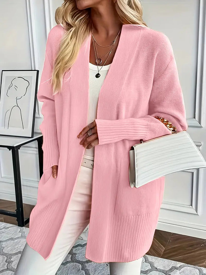 Nieuw gebreid damesvest met zakken, lange mouwen. Comfortabel en stijlvol voor casual herfstlooks.