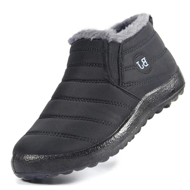 Warme heren instappers met antislipzool, waterdicht en comfortabel voor winterse omstandigheden.