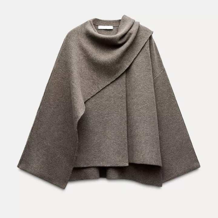 Veelzijdige dames mantel cape, ideaal als gelaagde bovenkleding. Stijlvolle en comfortabele herfst/winter mode.