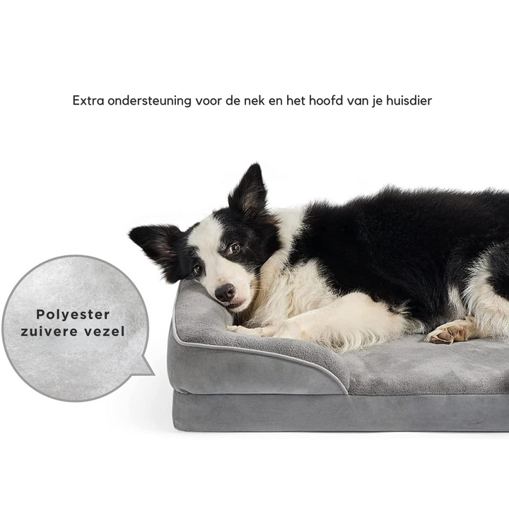 Close-up van het zachte pluche oppervlak van het grijze orthopedische hondenbed met traagschuim voor honden.