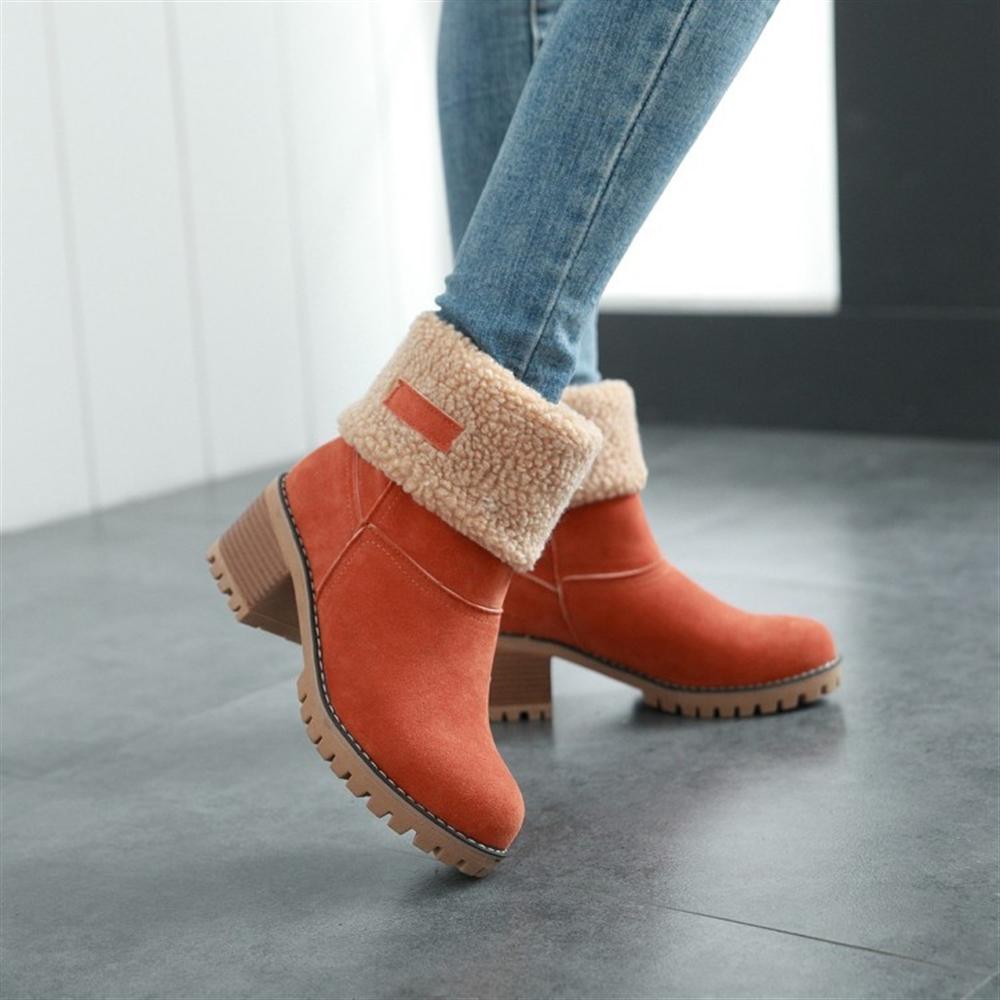 Elegante dames winterlaarzen, vooraanzicht, met warme voering en duurzaam design.