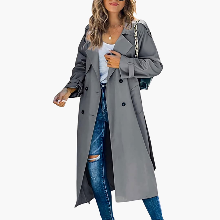 Modieuze dames trenchcoat, een veelzijdige en elegante mantel met knoopsluiting. Tijdloos design.