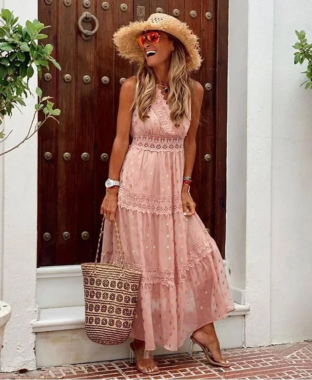 Comfortabele dames zomerjurk, mouwloze maxi met verhoogde taille, kant en flowy a-lijn pasvorm.