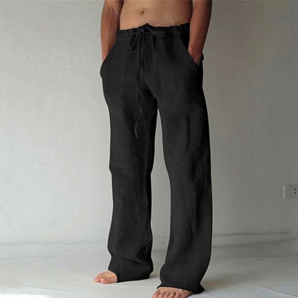 Comfortabele heren loungebroek met wijde pijpen, hoge taille. Geschikt voor ontspannen dagen en vrije tijd.