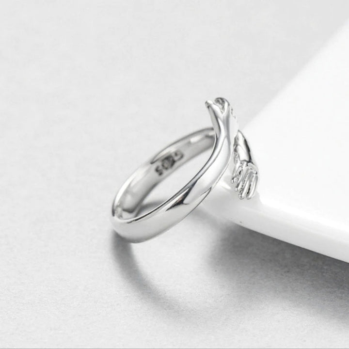Luxe zilveren dames knuffelring, verstelbaar, uitstekend juweel om liefde en vriendschap te vieren.