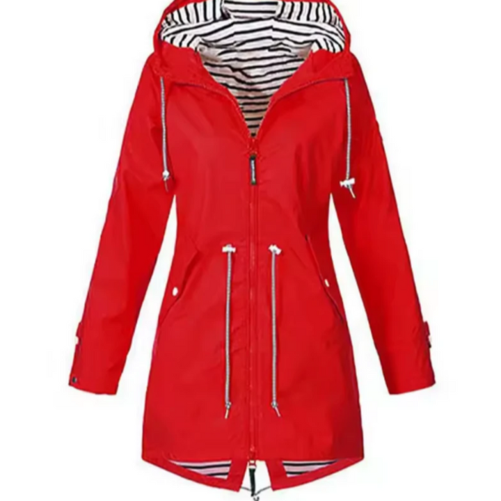 Nieuwe comfortabele dames regenjas met capuchon. Waterdicht en winddicht, klaar voor elk outdoor avontuur.