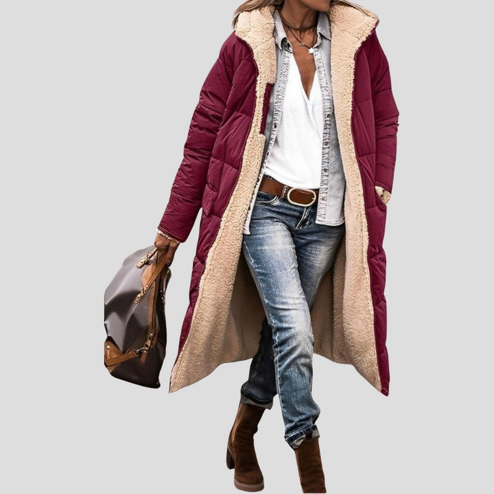 Trendy lange damesjas, omkeerbaar voor herfst en winter. Geschikt als casual bovenkleding.