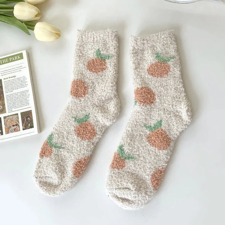 Ideaal cadeau: warme dames lounge sokken, één maat, met vrolijke print. Ultiem comfort voor thuis.