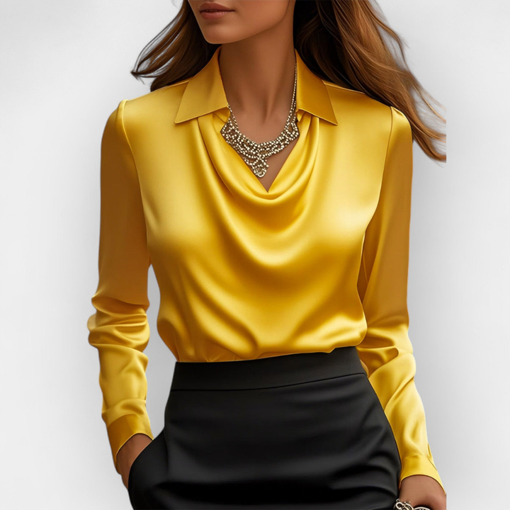 Verfijnde elegante damesblouse met watervalkraag, lange mouwen. Voor een chique en comfortabele stijl.
