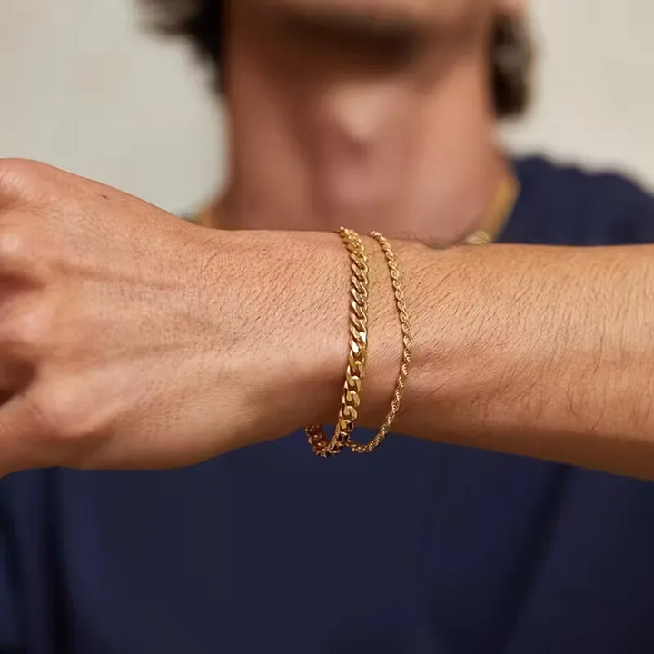 Moderne heren sieraden set: gouden Cuban Link schakelarmband en zilveren Rope Chain touwarmband. Perfect cadeau.
