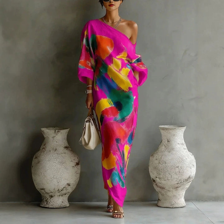 Comfortabele dames vrijetijdsjurk, off-shoulder model met unieke graffiti print. Ideale casual zomer- of strandjurk.