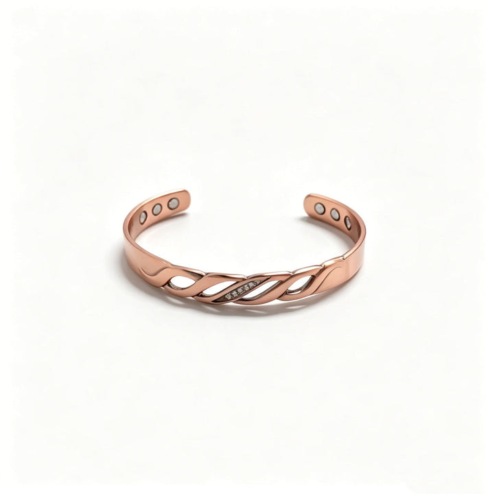 Stijlvolle koperen damesarmband met paarse zirkonia en oneindigheidssymbool, perfect cadeau voor vrouwen.
