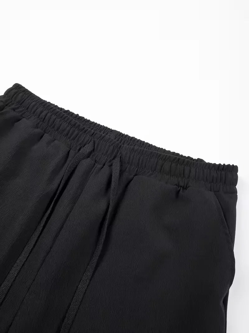 Marineblauwe heren plissé shorts, ultiem zomercomfort en casual elegantie.