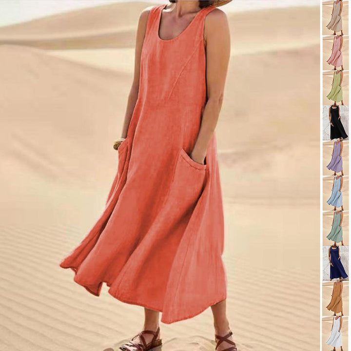 Elegante dames zomerjurk, mouwloos en losvallend, met praktische zakken.