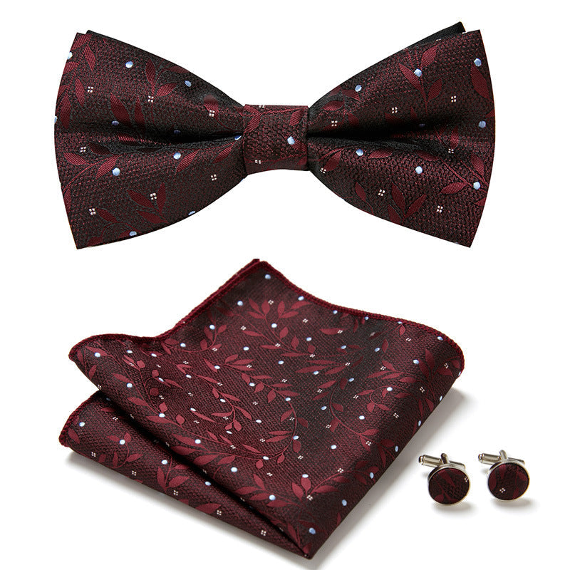 Perfect geschenk: heren vlinderstrikset met bloemendesign, inclusief pochet en manchetknopen voor de moderne man.