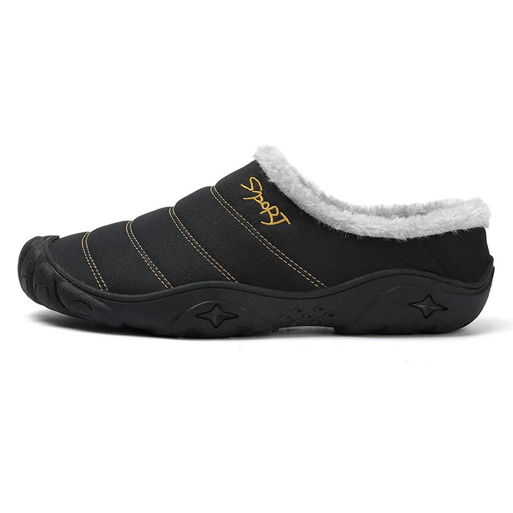 Grijze heren instappers, warme binnenpantoffels. Antislip sloffen voor optimaal thuiscomfort.