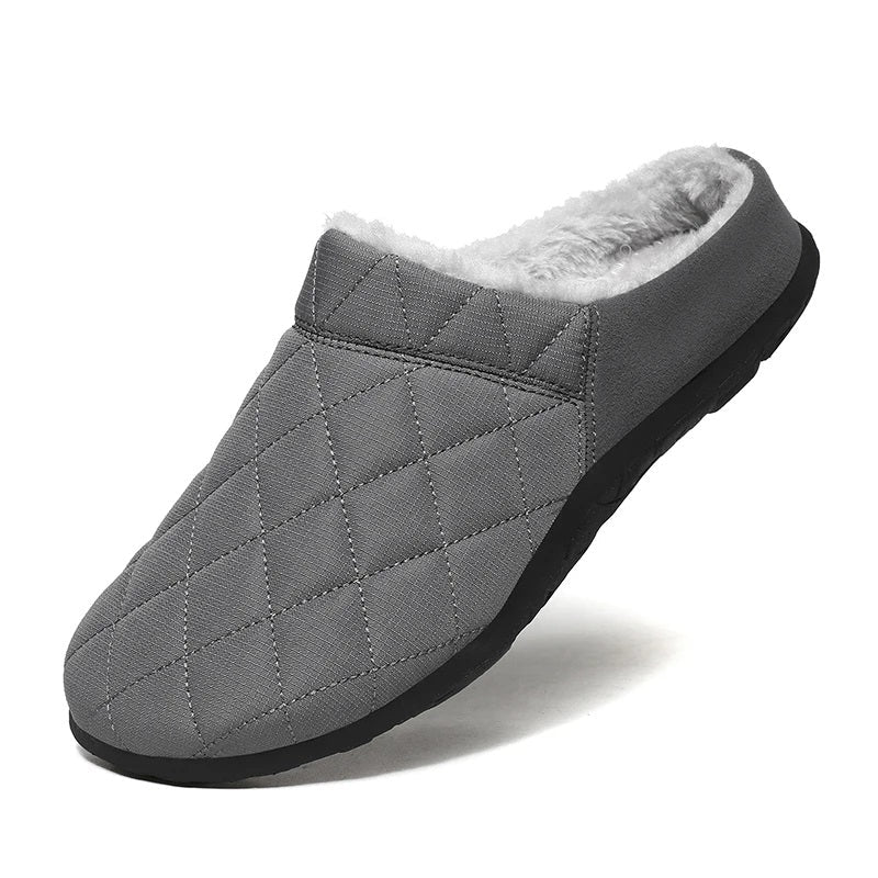 Grijze heren pantoffels, extra warm en zacht, perfect voor ontspanning thuis.