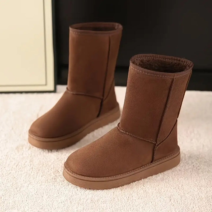 Comfortabele Aria slip-on winterlaarzen met dikke fleecevoering. Warme unisex boots voor dagelijks gebruik.