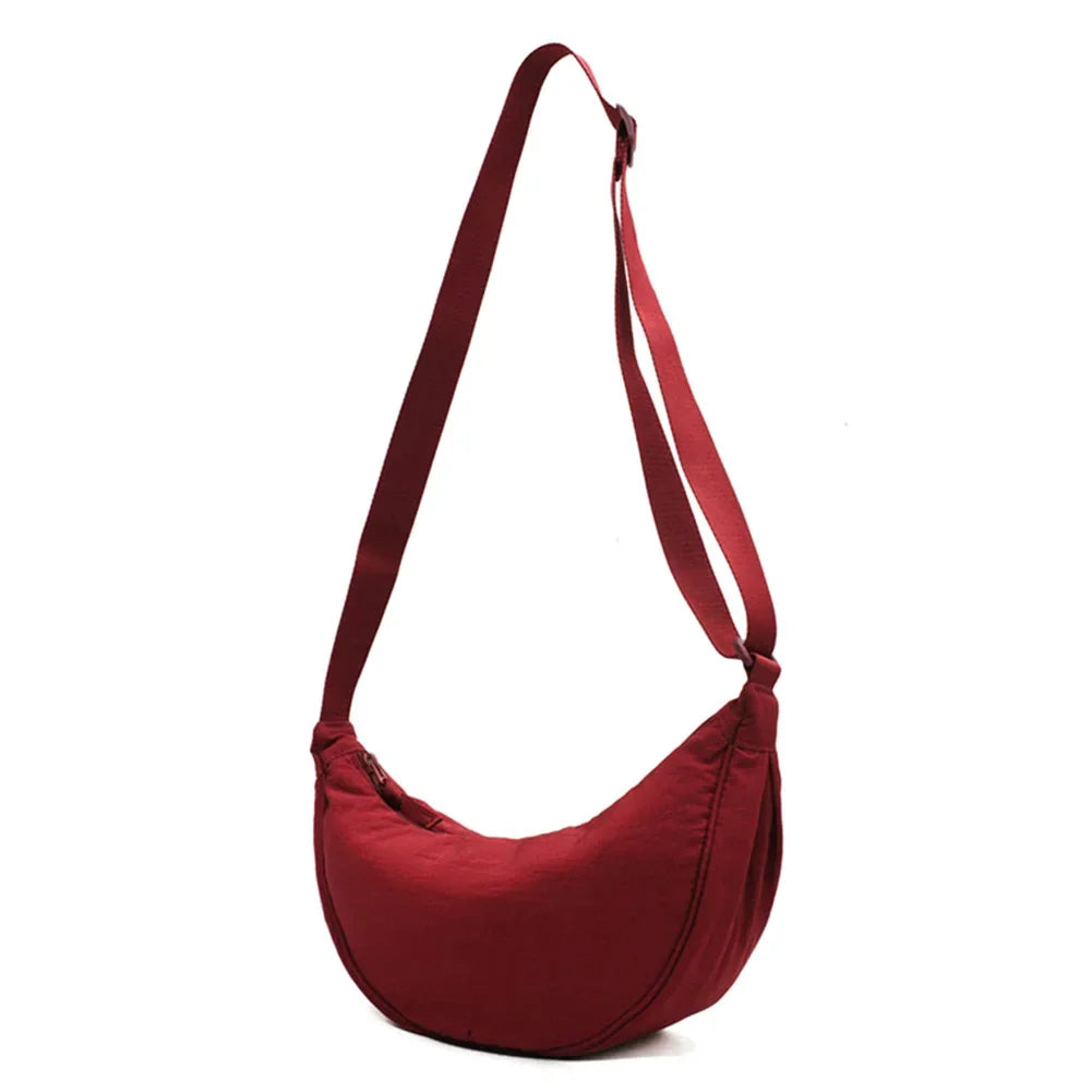 Modieuze dames dumpling tas, perfect als crossbody of schoudertas voor een casual look.