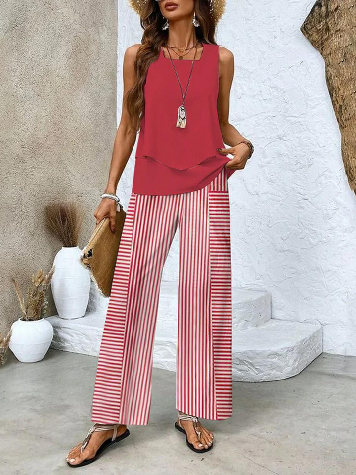 Dames zomer outfit: tweedelige set met mouwloze top en wijde broek, ideaal voor strand of vakantie.
