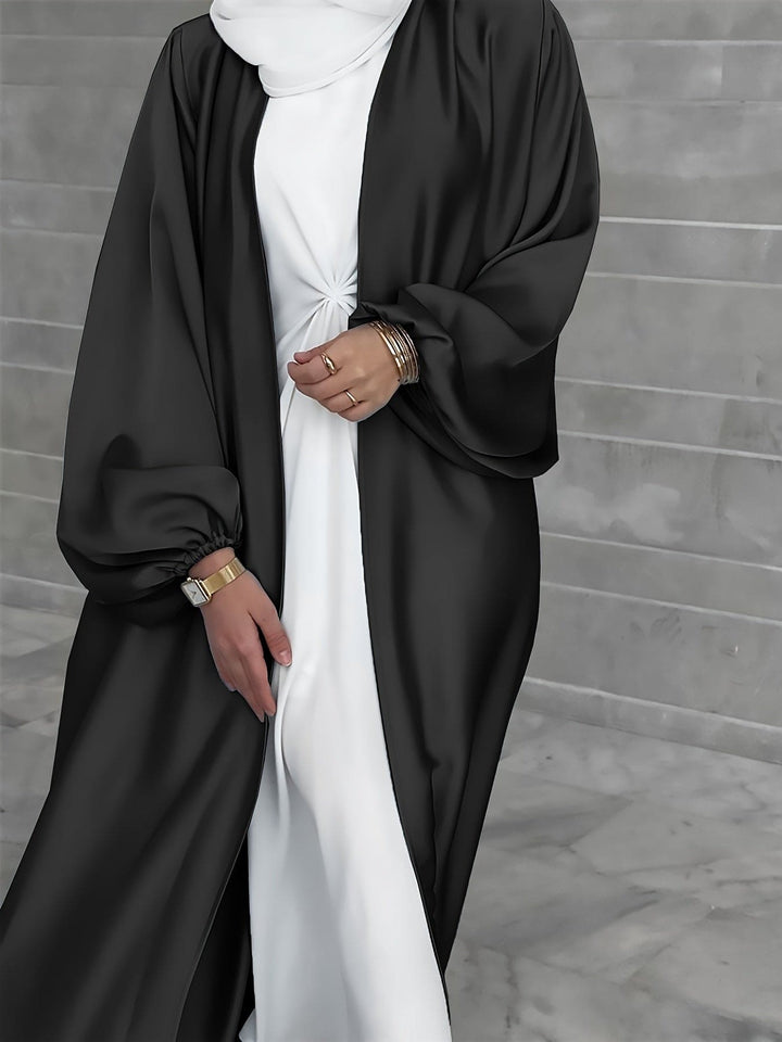 Elegante abaya maxijurk met riem voor dames. Stijlvolle modest fashion voor elke gelegenheid.