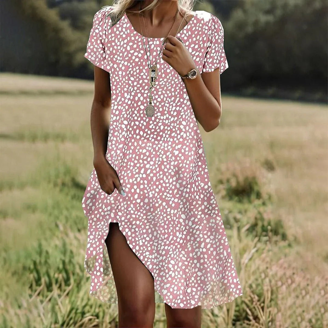 Dames jurk met ronde hals en artistieke etnische prints. Een comfortabele midi-jurk, stijlvol voor zomer & lente.