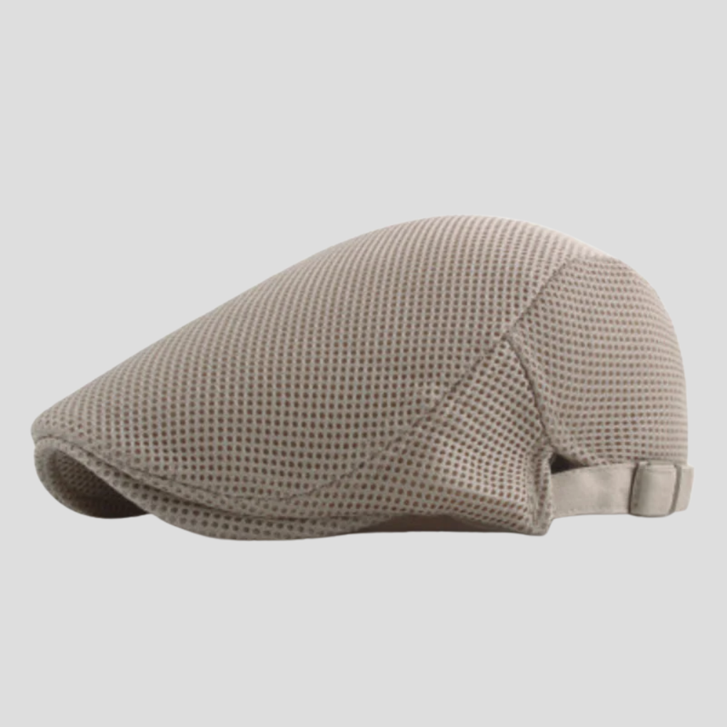 Klassieke herenpet in mesh-design, een tijdloos accessoire voor een casual look met ademend comfort.