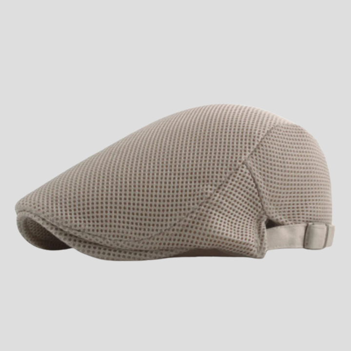 Klassieke herenpet in mesh-design, een tijdloos accessoire voor een casual look met ademend comfort.