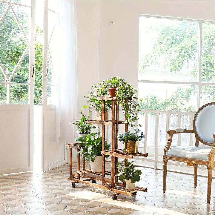 Robuuste houten plantenstandaard, 6-laags en gecarboniseerd, geschikt als plantenrek voor tuin en huis.