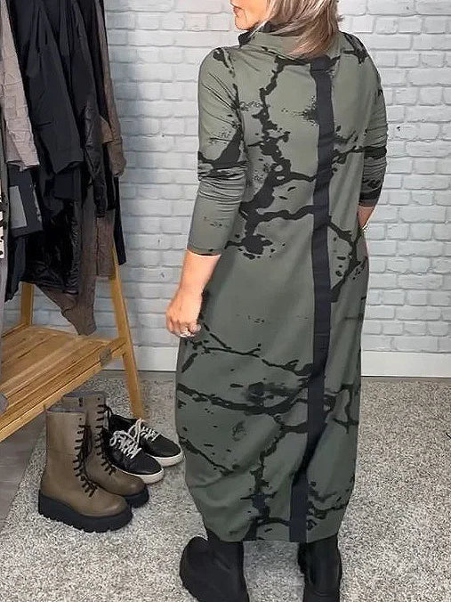 Comfortabele dames jurk met lange mouwen, retro print. Geschikt als casual jurk of feestelijke outfit.