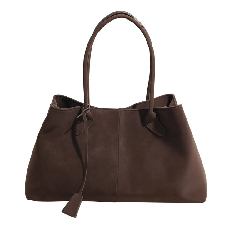 Functionele dames schoudertas in zwart. Ruime handtas voor dagelijks gebruik, elegant en modieus voor werk.