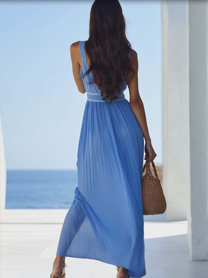 Details van de zachte stof van de lichtblauwe dames maxi jurk; ademend en perfect voor warm weer.