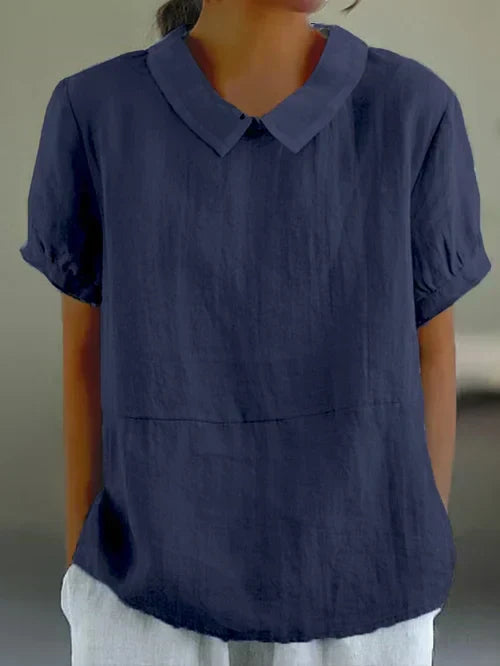 Klassieke effen top voor dames, een must-have basic. Stijlvol en comfortabel, ideaal voor elke gelegenheid.