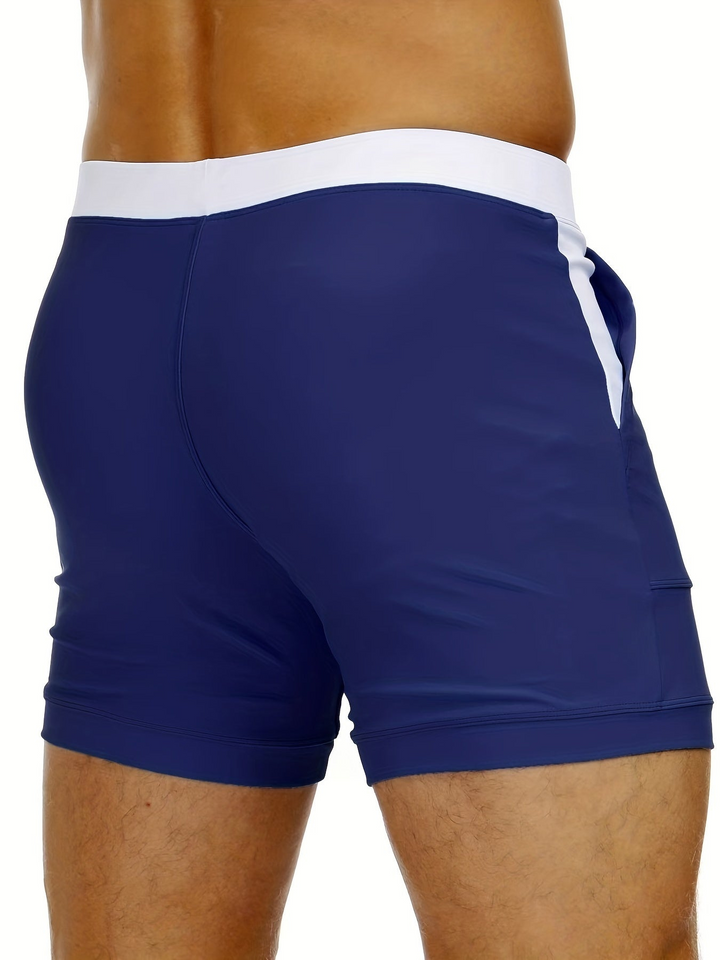 Stijlvolle heren zwemshort Elias. Comfortabele, elastische pasvorm voor zwemmen en zomerse activiteiten. Moderne strandkleding.