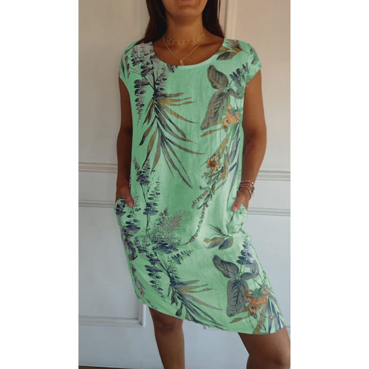 Stijlvolle damesjurk voor elk seizoen. Elegante midi jurk, comfortabel en modieus. Perfecte pasvorm.