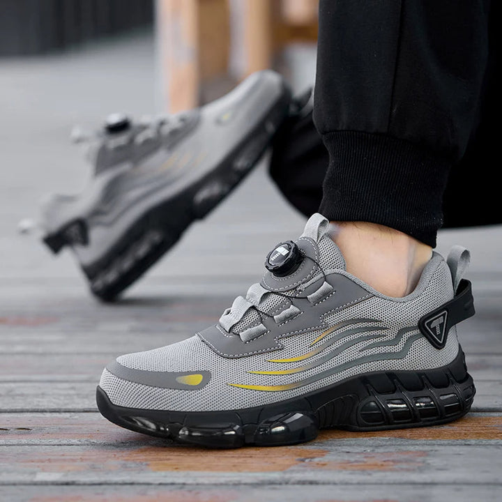 Zijaanzicht van de ademende werkschoenen met stalen neus, toont modern design en unisex pasvorm.