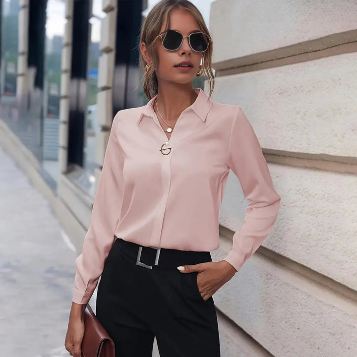 Elegante Hoymans dames blouse met lange mouwen en klassieke kraag, perfect voor elke gelegenheid.