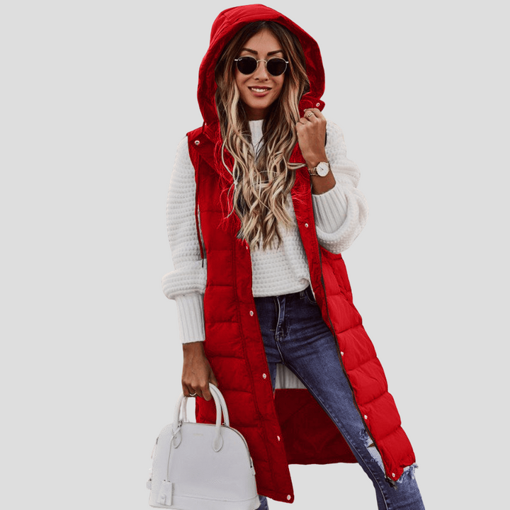 Mouwloos gewatteerd vest voor dames, lange bodywarmer met capuchon; de ideale tussenjas.