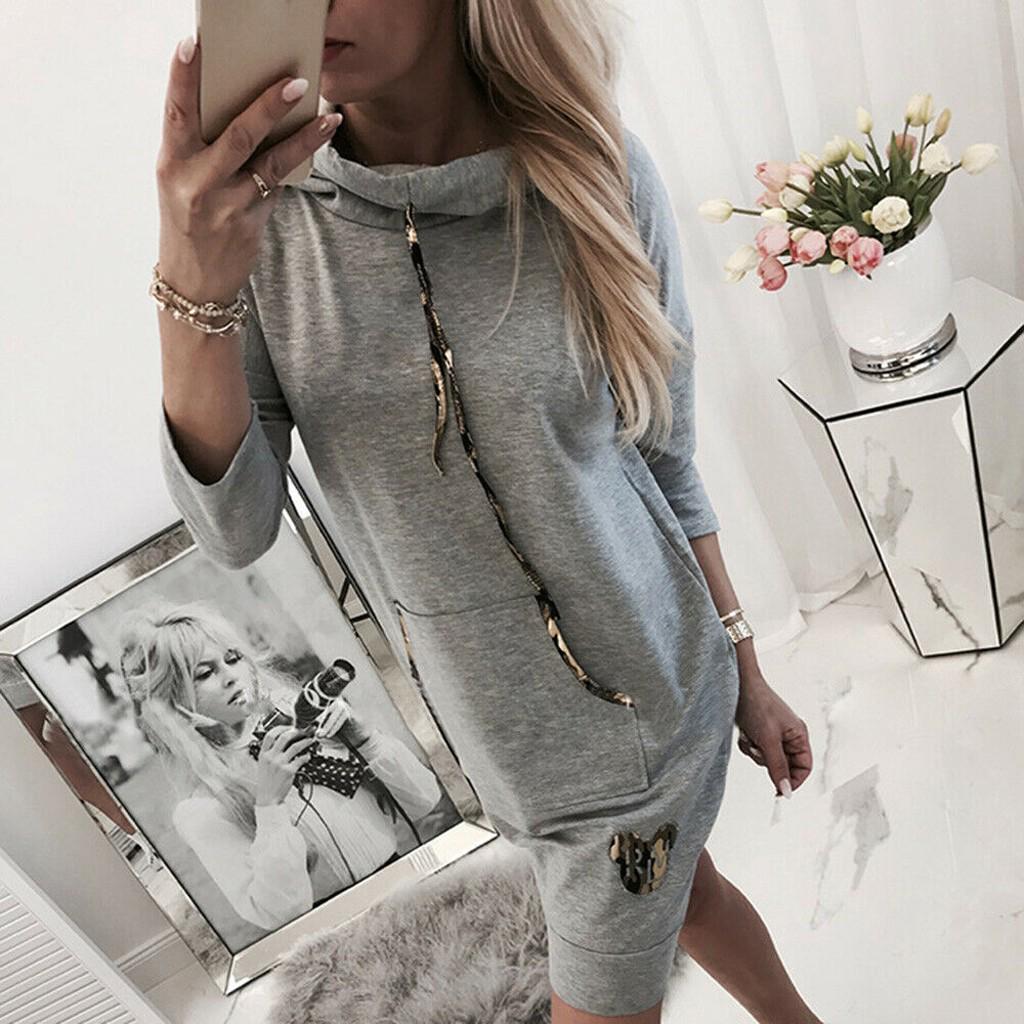 Comfortabele dames trui met capuchon, ideaal voor herfst en winter. Zachte stof, ontspannen pasvorm.