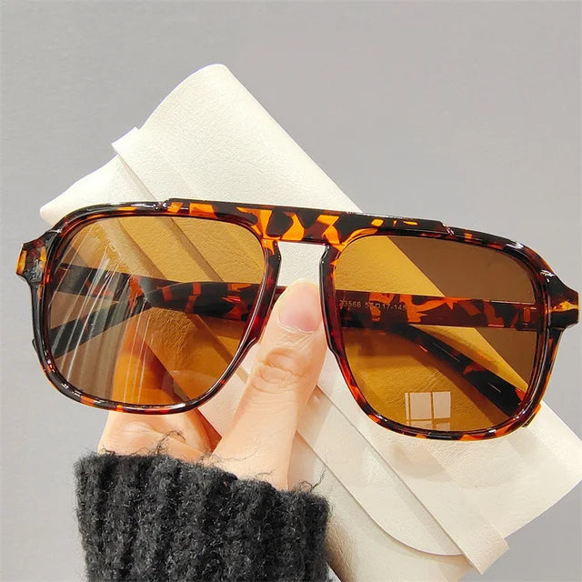 Zomerse oversized zonnebril voor heren, biedt optimale UV400 bescherming en een unieke vintage stijl.