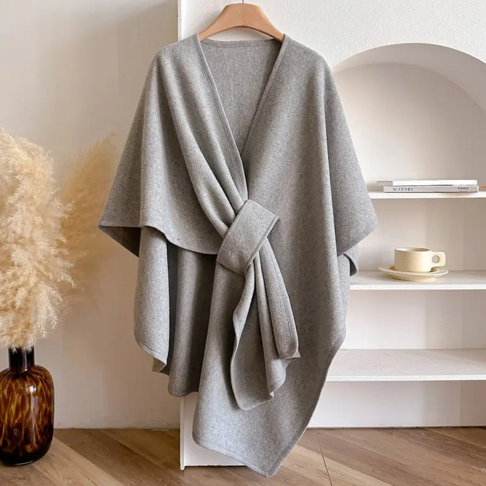 Celeste dames winter omslagdoek. Winddicht, warm en comfortabel; een modieuze sjaal/poncho accessoire.