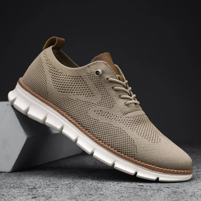 Sportieve herensneakers met ademend mesh bovenwerk en lichtgewicht zool, perfect voor casual comfort.