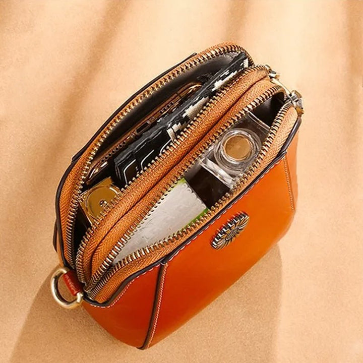 Reisvriendelijke dames leren tas, een compacte crossbody met een tijdloos en modern design.