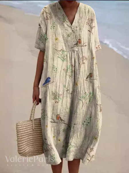 Casual strandjurk met bloemenprint, een luchtige en vrolijke damesjurk voor zonnige dagen.