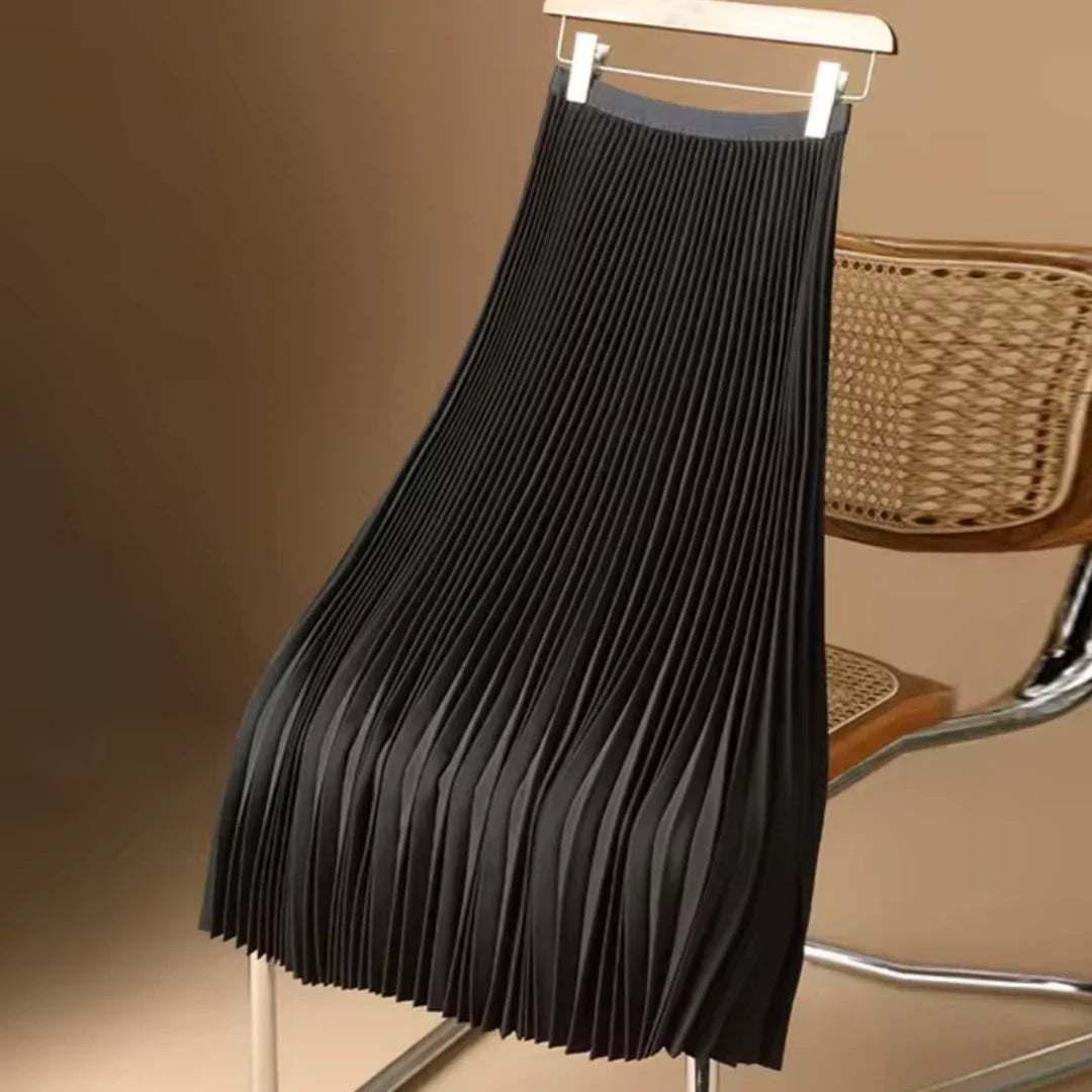 Elegante dames plooirok midi lengte, veelzijdig en modieus, perfect voor zowel casual als chique kleding.